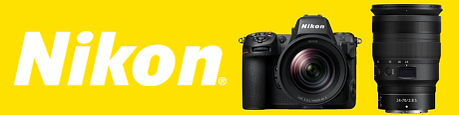 Nikon logo and camera with lens on yellow background theshutterbug