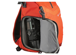 Orange camera backpack with a camera inside and theshutterbug